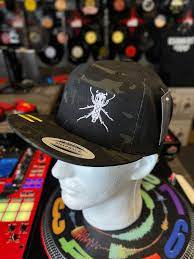 Sold Out Here But You Can Still Find Them at MileHighDJSupply.com! ThudRumble All Black Flexfit Hat with Grey Beedle Logo!