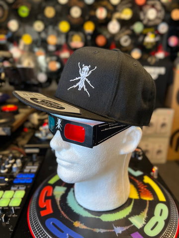 Sold Out Here But You Can Still Find Them at MileHighDJSupply.com! ThudRumble All Black Flexfit Hat with Grey Beedle Logo!